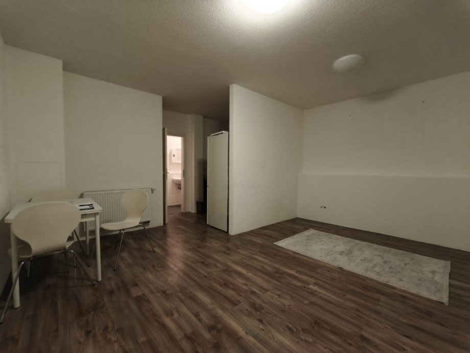 Wohnzimmer EG rechts Mehrfamilienhaus Stuttgart